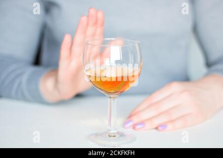 young woman refuses alcohol Stock Photo