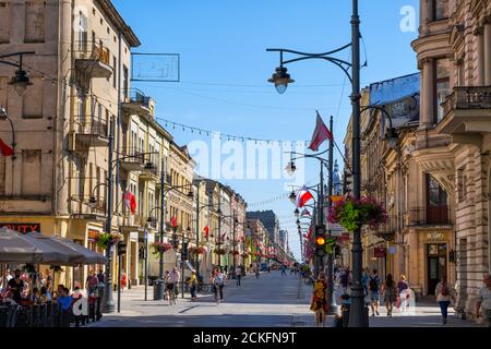 Lodz, Poland - August 5, 2020: People on Piotrkowska Street, city landmark and major tourist attraction Stock Photo