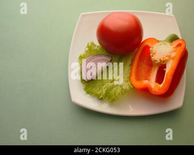 Red vegetables on a plate, close-up Stock Photo