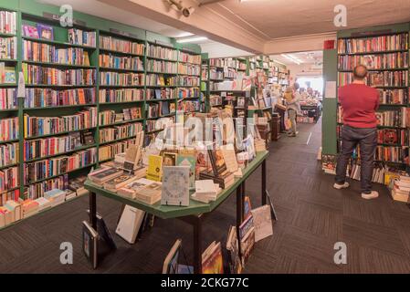 Old, new and used books on for sale in a book store on King Street, Newtown, Sydney, Australia Stock Photo