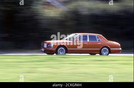 Driving a 1999 Bentley Mulsanne Turbo Red label Stock Photo