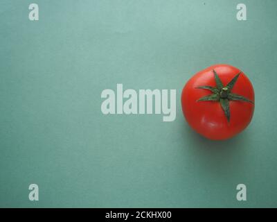 Red tomato close-up. Stock Photo