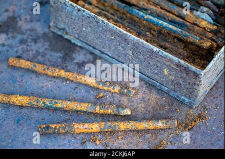 Old metal studs covered in rust, close-up, selective focus Stock Photo