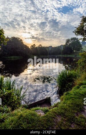 Reflections on Tong Park Dam, Baildon, Yorkshire, England. Stock Photo