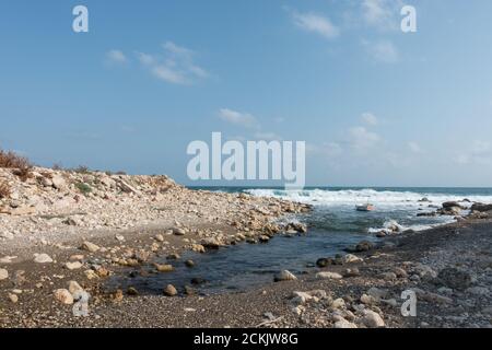 Small fishing boat moored off Gerani beach, Crete. Greeece Stock Photo