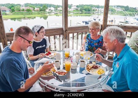 Hampton Virginia,Tidewater Area,Hampton River marina boats boating,harbor yachts restaurant dining eating out family couples table food al fresco Stock Photo