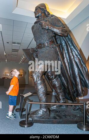 Virginia Newport News Mariners' Museum and Park,history exhibit collection display,visitor boy looking Leiv Leifr Eirikson Leif Erikson Ericson statue Stock Photo