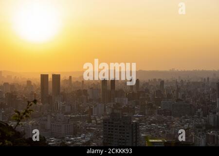 View from above, stunning sunset over the Taipei City skyline. Panoramic view from the Mount Elephant in Taipei, Taiwan. Stock Photo