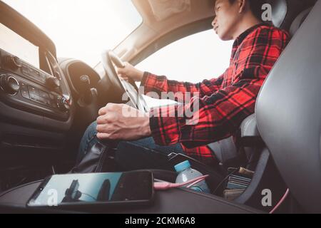 Car Driving Concept.Man driver shifting to drive mode or change gear .Close Up hand on transmission stick Stock Photo