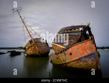 Boat graveyard at Pin Mill on the river Orwell, Shotley Peninsula, near Ipswich, Suffolk, UK Stock Photo