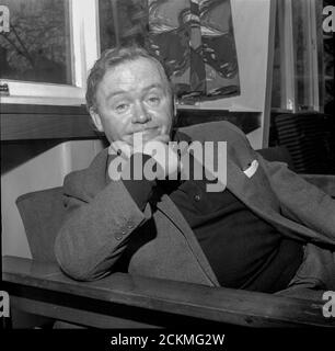 Comedian, actor, writer and television star Charlie Drake smiles for the camera in 1965 Stock Photo