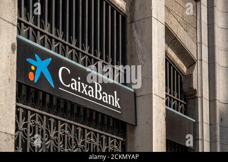 Barcelona, Spain. 16th Sep, 2020. The Caixabank logo is seen in one of the bank offices in Barcelona.The boards of directors of the Spanish banking entities Caixabank and Bankia will approve the merger of the two entities into a new bank that will become the first Spanish bank in asset classification. Credit: SOPA Images Limited/Alamy Live News Stock Photo