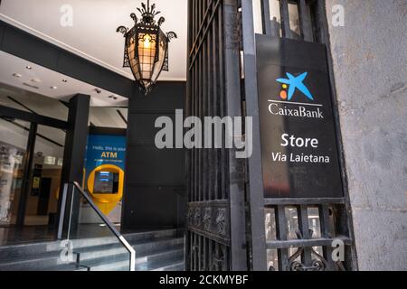 Barcelona, Spain. 16th Sep, 2020. The Caixabank logo is seen in one of the new Store centers in Barcelona.The boards of directors of the Spanish banking entities Caixabank and Bankia will approve the merger of the two entities into a new bank that will become the first Spanish bank in asset classification. Credit: SOPA Images Limited/Alamy Live News Stock Photo