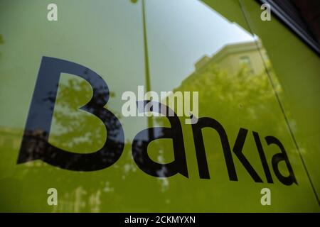 Barcelona, Spain. 16th Sep, 2020. The Bankia logo is seen on the facade of one of its bank offices in Barcelona.The boards of directors of the Spanish banking entities Caixabank and Bankia will approve the merger of the two entities into a new bank that will become the first Spanish bank in asset classification. Credit: SOPA Images Limited/Alamy Live News Stock Photo