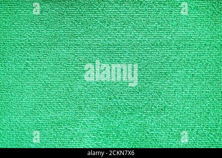 Cleaning microfiber pattern. Green polyester microfibre texture. Synthetic fiber material Cleaning cloth for dust or kitchen top view Stock Photo