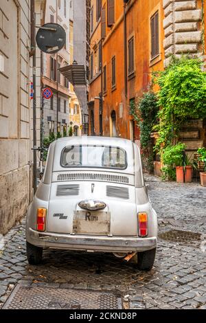 A FIAT 500 parked in a street in Rome Stock Photo - Alamy