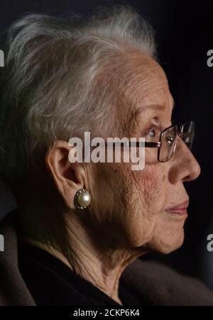NASA "human computer" Katherine Johnson watches the premiere of "Hidden Figures" after a reception where she was honored along with other members of the segregated West Area Computers division of Langley Research Center, on Thursday, December 1, 2016, at the Virginia Air and Space Center in Hampton, Virginia. Johnson was the African American mathematician, physicist, and space scientist, who calculated flight trajectories for John Glenn's first orbital flight in 1962. Stock Photo