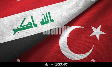 Iraq and Turkey two flags textile cloth, fabric texture Stock Photo