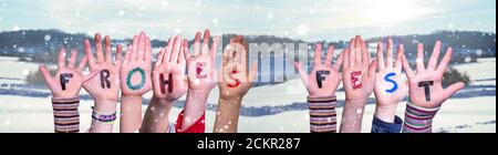 Children Hands Building Frohes Fest Means Merry Christmas, Winter Background Stock Photo