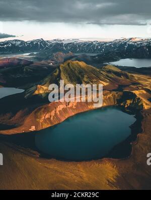 Aerial view of Hnausapollur Crater Lake in the Highlands of Iceland during the golden hour and sunset. Beautiful summer in Iceland. Tourism in the Stock Photo