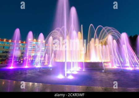 Anapa, Russia - July 17, 2020: View of a large beautiful multi-colored fountain in front of the city administration building of the Anapa resort Stock Photo