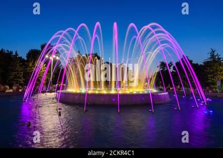 Anapa, Russia - July 17, 2020: A beautiful multi-colored fountain with high jets, located near the administration building in the city of Anapa resort Stock Photo