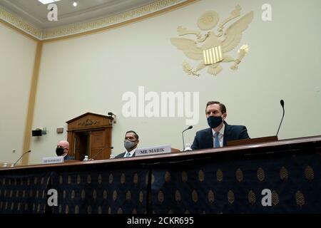 From left to right: R. Clarke Cooper, assistant secretary of state for political-military affairs at the United States Department of State, Brian Bulatao, under secretary of state for management at the U.S. Department of State, and Marik String, acting legal adviser at the U.S. Department of State, listen during a House Foreign Affairs Committee hearing in Washington, DC, U.S., on Wednesday, Sept. 16, 2020. The hearing is investigating the firing of State Department Inspector General Steve Linick. Credit: Stefani Reynolds/Pool via CNP /MediaPunch Stock Photo