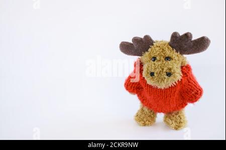 Children Toy collection, Soft brown deer on a white background. soft christmas toy brown deer. Stock Photo