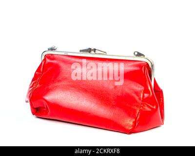 Red female cosmetic bag on a white background. Stock Photo