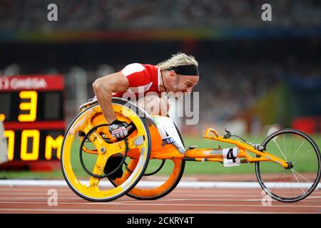 Beijing, China  September 12, 2008: Day six of athletic competition at the 2008 Paralympic Games with Austria's Thomas Geierspichler at the start of the T52 men's 400-meters. ©Bob Daemmrich Stock Photo