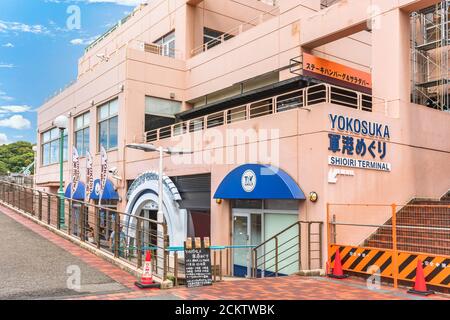 yokosuka, japan - july 19 2020: Entrance of the Shoppers Plaza Yokosuka shopping center with the desk of the cruise of Yokosuka Naval Port at Shioiri Stock Photo
