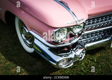 The fragment of the front part of the full-size luxury car Cadillac Series 62 (sixth generation), 1959. The exhibition of 'US Car Classics'. Stock Photo