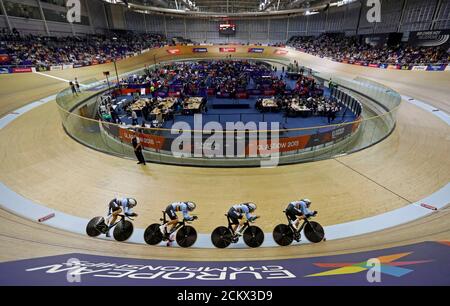 Lindsay De Vylder Kenny De Ketele Robbe Ghys And Fabio Van Den Bossche Of Belgium During The Mens Team Pursuit First Round During Day One Of The Tissot Uci Track Cycling World