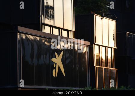 Barcelona, Spain. 16th Sep, 2020. La Caixa - Caixabank Catalan bank's logo seen at its headquarters in Barcelona.Caixabank and Bankia have reached a merger deal to create Spain's largest financial institution, with a combined market value of around 16 billion euros ($18.96 billion). Boards of directors are set to approve the deal soon. Credit: Jorge Sanz/SOPA Images/ZUMA Wire/Alamy Live News Stock Photo