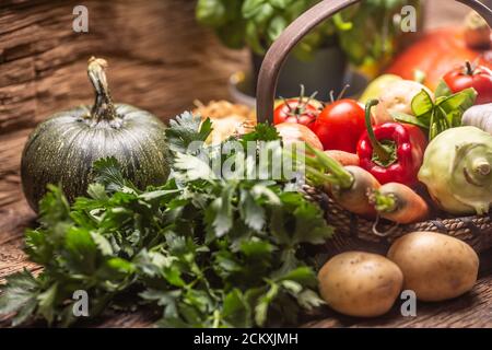 Selection of autumn fresh harvest of vegetables on a vintage wooden surface Stock Photo