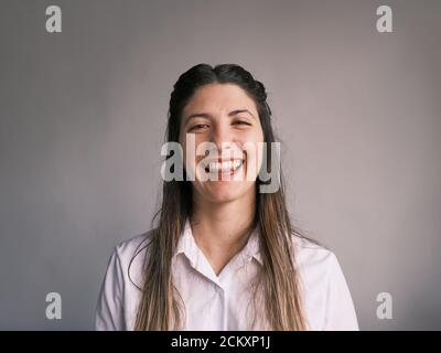 passport photo of cute and well dressed Caucasian girl in shirt Stock Photo