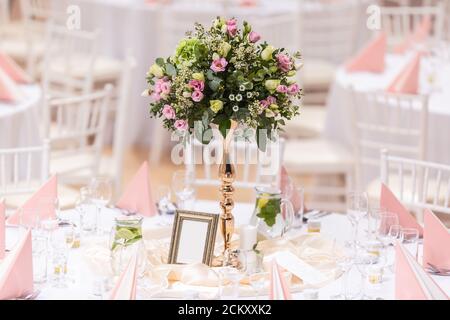 Wedding flower bouquet on a decorated festive table Stock Photo