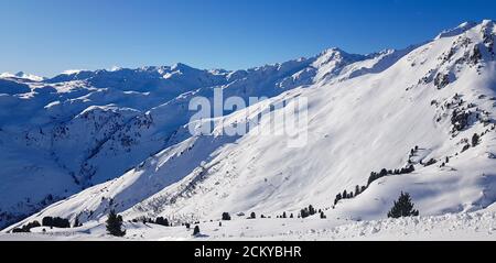 Mountain peaks covered in snow Stock Photo