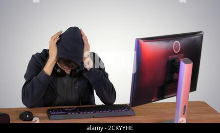 Stressed tired out of work, Development Programmer on gradient b Stock Photo