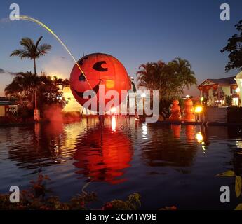A jack-o-lantern fountain on Halloween night at Dreamworld theme park, Queensland, Australia Stock Photo