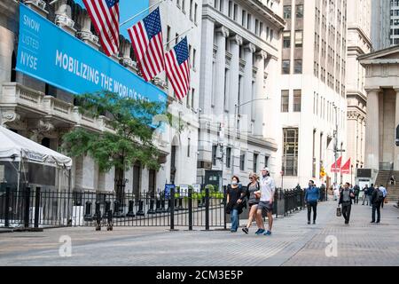 Manhattan, New York, USA. 16th Sep, 2020. An overall view of people walking with masks on Wall Street in Manhattan, New York. Mandatory credit: Kostas Lymperopoulos/CSM/Alamy Live News Stock Photo