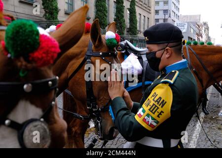 Mexico City, Mexico. 16th Sep, 2020. A soldier pacifies a horse before attending Mexico's Independence Day military parade in Mexico City, capital of Mexico, Sept. 16, 2020. Credit: Israel Rosas/Xinhua/Alamy Live News Stock Photo