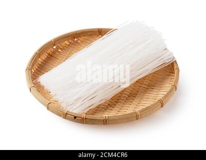 glass noodles in a colander on a white background Stock Photo