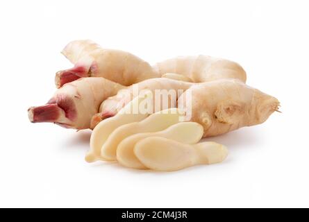 Fresh ginger and sliced fresh ginger on a white background Stock Photo