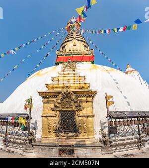 Tower of the Boudhanath Stupa decorated with flags in Kathmandu, Nepal. Stock Photo