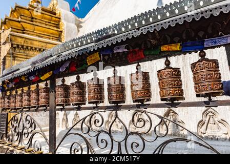 Prayer wheels at Boudhanath Stupa in Kathmandu, Nepal Stock Photo