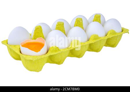 chicken eggs in a package, isolated on a white background, one egg is open, food concept Stock Photo