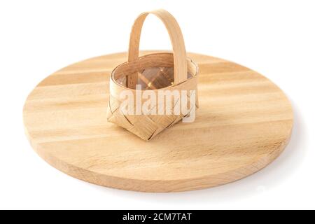 decorative basket wooden board on isolated white background. Basket wicker Stock Photo