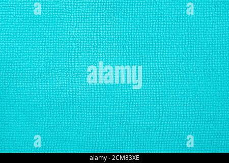 Surface of cyan blue microfiber cloth, macro textile pattern background. Stock Photo