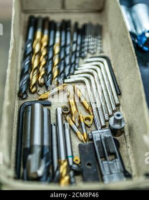 Flat lay various Size of cutting tools used carbide Endmills for machining center in metal work. Stock Photo